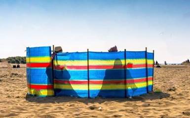 Как безопасно загорать на пляже в период и после пандемии коронавируса
