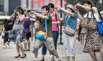 Города