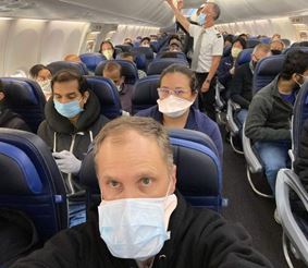 Как защитить себя от заражения коронавирусом во время авиаперелёта