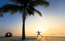 Время йоги в Dhigali Maldives.
